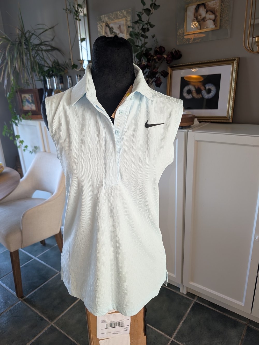 Women's Nike Light Blue Sleeveless Polo Tank Top with Black Swoosh